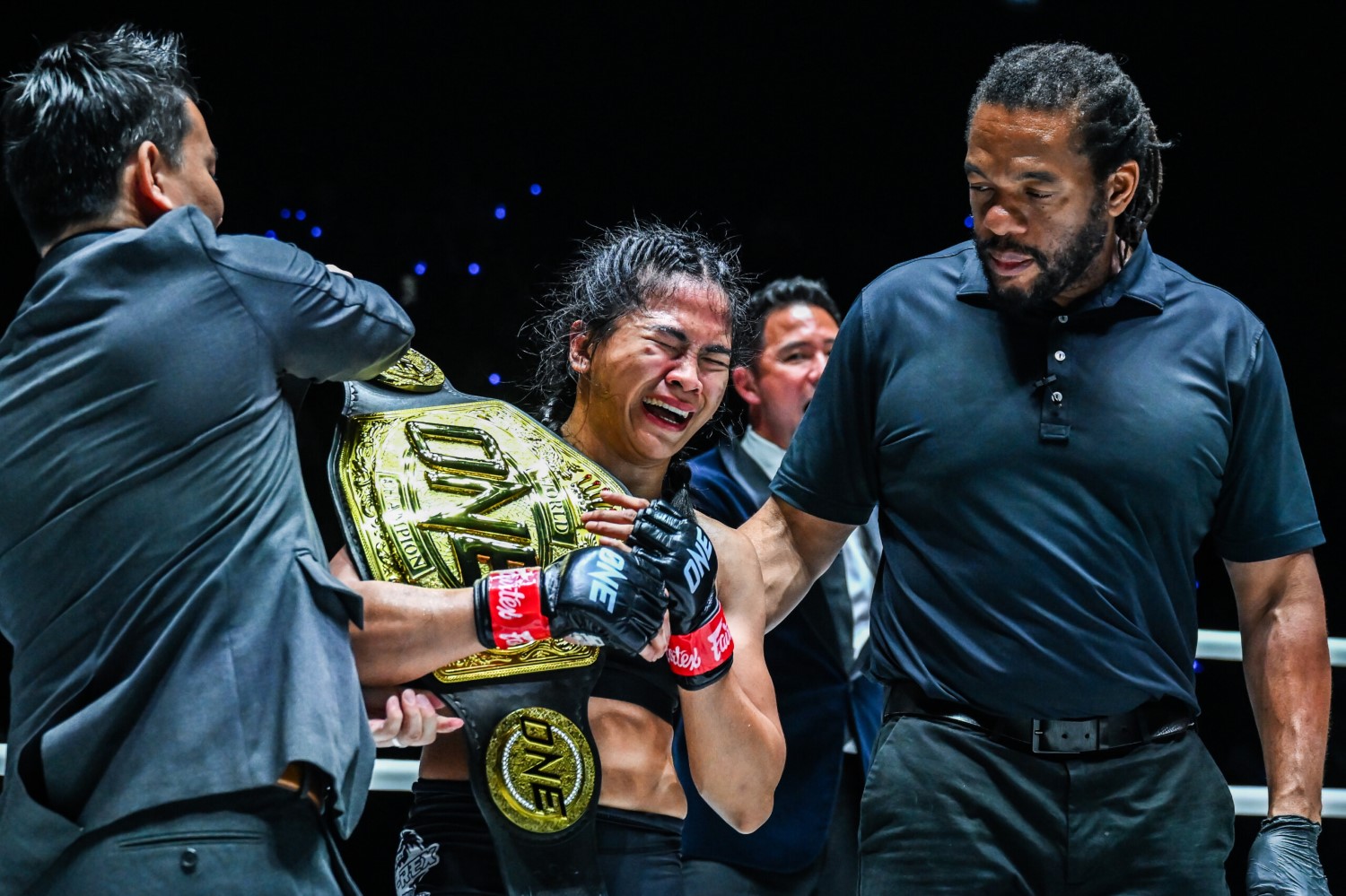 An emotional Denice Zamboanga receives the ONE interim atomweight MMA world title after her TKO win over Alyona Rassohyna.