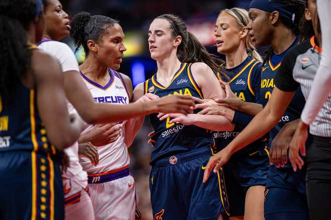 Phoenix Mercury v Indiana Fever Alyssa Thomas #25 of the Phoenix Mercury and Caitlin Clark #22 of the Indiana Fever get into a scuffle during the game at Gainbridge Fieldhouse on June 22, 2026, in Indianapolis, Indiana.