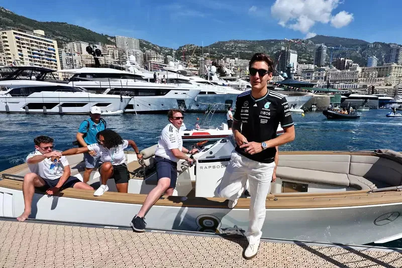 George Russell gets a boat to work during the Monaco GP