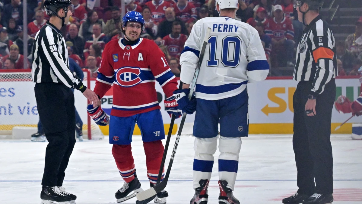 Montreal Canadiens forward Brendan Gallagher (11) and Tampa Bay Lightning forward Corey Perry (10) exchange words during the third period in game six of the first round of the 2026 Stanley Cup Playoffs at the Bell Centre.