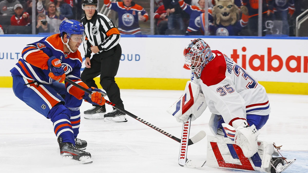 Montreal Canadiens goaltender Sam Montembeault (35) makes a save on Edmonton Oilers forward Mattias Janmark (13) during the third period at Rogers Place.