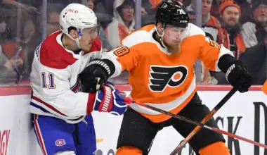 Philadelphia Flyers defenseman Rasmus Ristolainen (70) and Montreal Canadiens right wing Brendan Gallagher (11) battle behind the net during the first period at Wells Fargo Center.