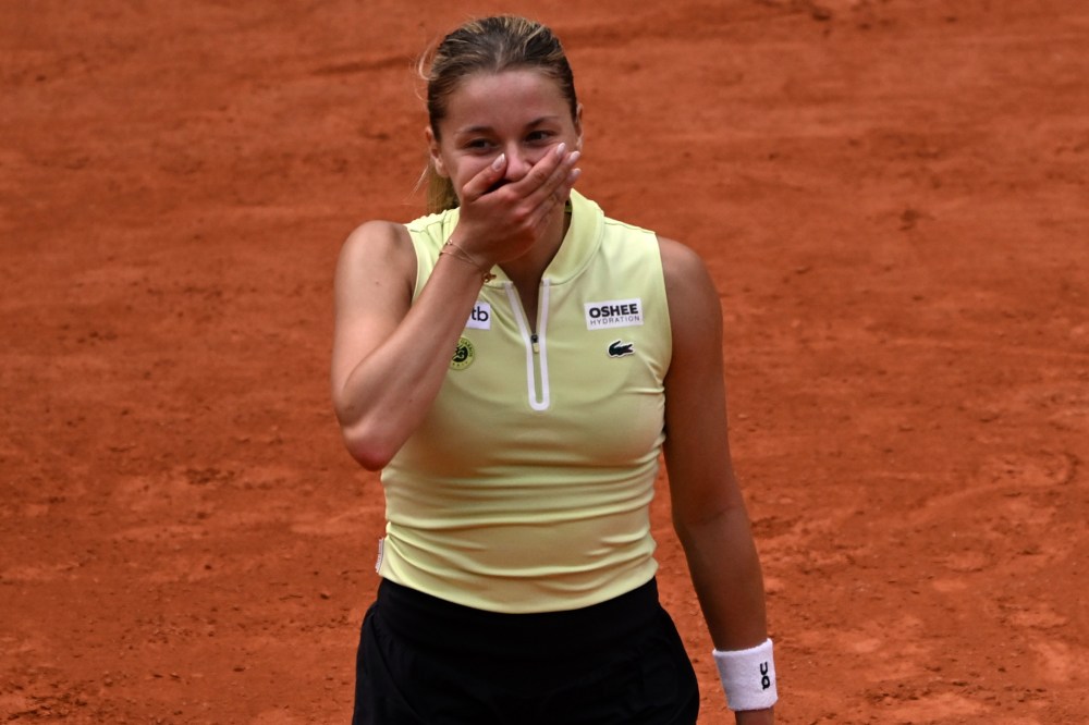 Poland's Maja Chwalinska reacts after winning the quarterfinal tennis match against Russia's Anna Kalinskaya at the French Open in Paris, Wednesday, June 3, 2026. (AP Photo/Emma Da Silva)