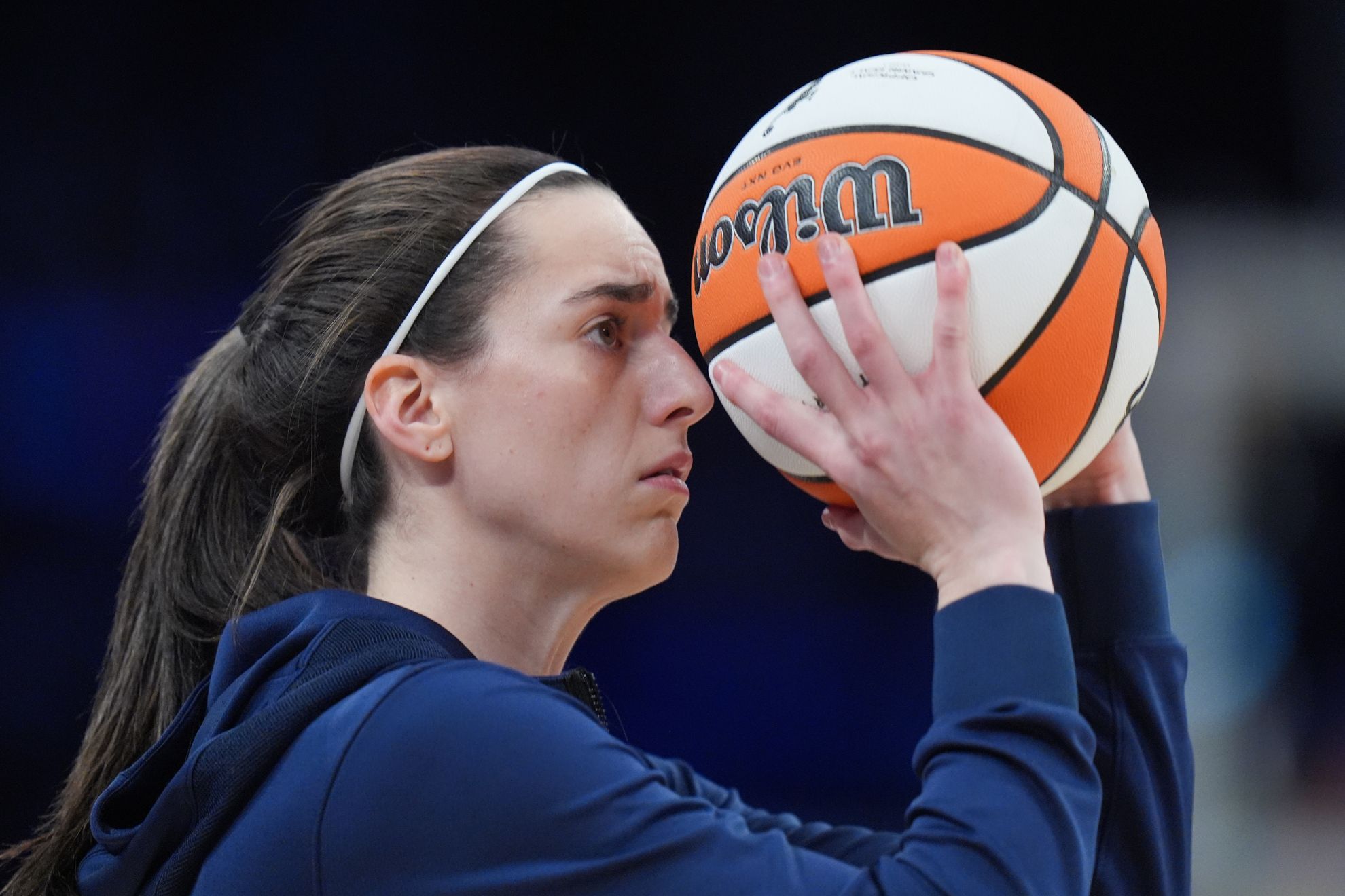 Indiana Fever guard Caitlin Clark warms up before the team's WNBA basketball