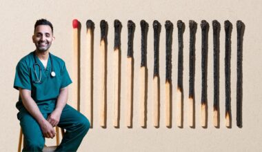Dr Amir Khan next to burnt out matches, representing the physical signs of stress