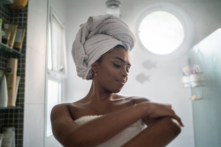 Cleansing your skin with your hands — and not with a washcloth or loofah — is the best way to get clean in the shower.