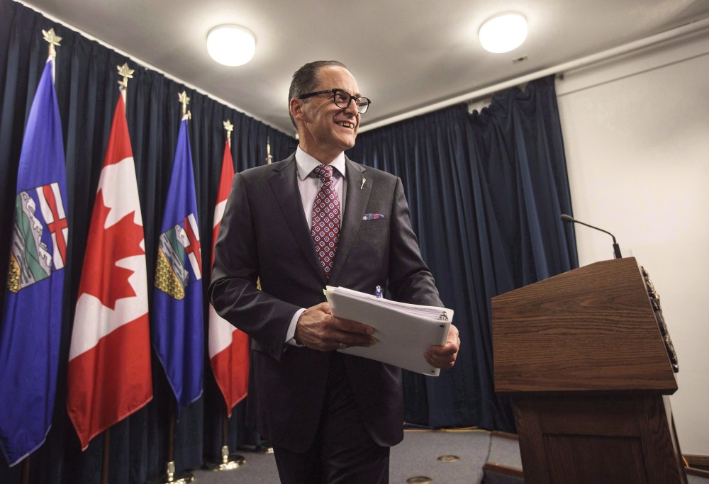 Alberta Finance Minister Joe Ceci leaves after speaking about the Government of Alberta's 2016-17 year-end financial results, in Edmonton on Thursday, June 29, 2017. THE CANADIAN PRESS/Jason Franson