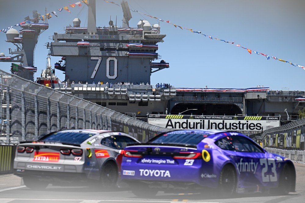 Shane Van Gisbergen (97) and Bubba Wallace (23) come out of Turn 2 during a NASCAR Cup Series auto race, Sunday, June 21, 2026, in Coronado, Calif. (AP Photo/Denis Poroy)
