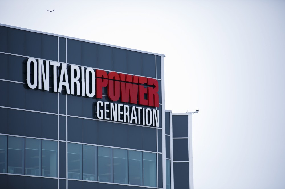 Ontario Power Generation signage is seen facility at the Darlington Power Complex, in Bowmanville, Ont., on May 31, 2019. Ontario's public generating company has pulled the plug on its plan to bury hazardous radioactive waste near the Lake Huron shoreline.THE CANADIAN PRESS/Cole Burston