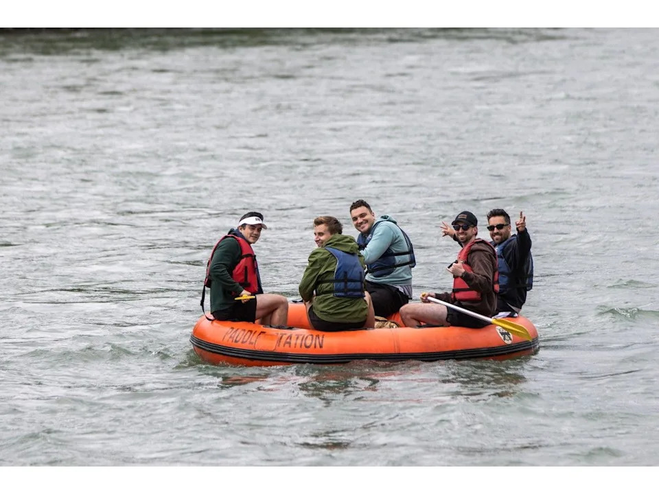 Rafters enjoy a float despite the high waters on the Bow River in Calgary on Saturday.
