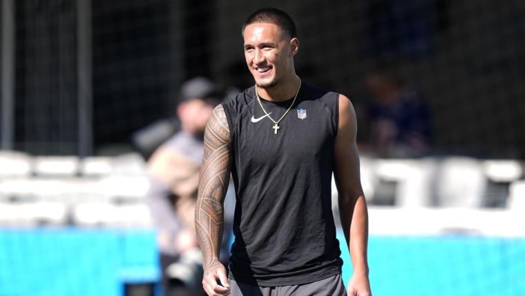 More muscular Tetairoa McMillan rests during NFL mandatory minicamp, revving up for Panthers' training camp