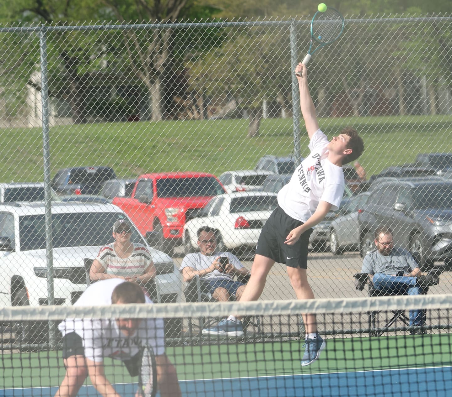 Ottawa's Ayden Sexton and Kaden Araujo play tennis against La Salle-Peru this past season in the Henderson-Guenther Tennis Facility at Ottawa High School.