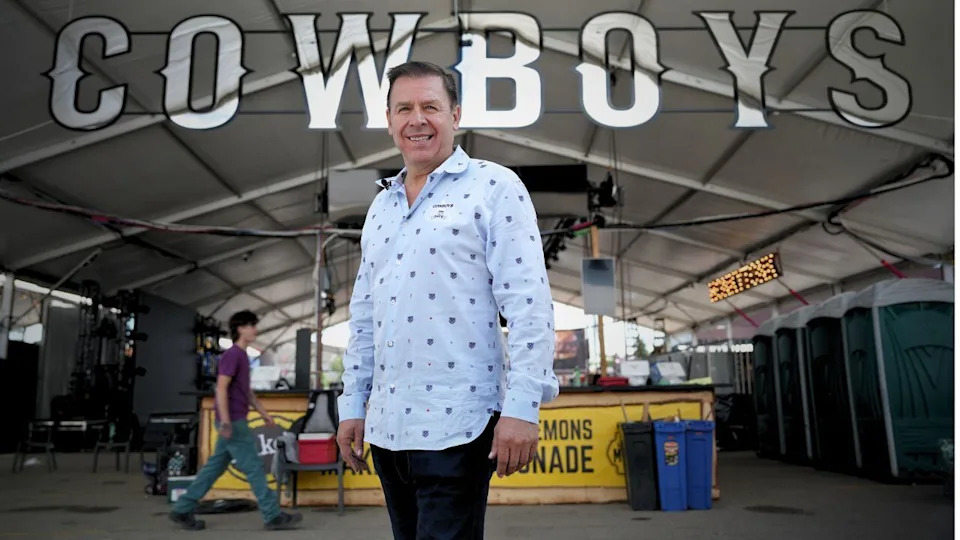 Paul Vickers, president of  President of Penny Lane Entertainment, stands at one of the tents on site at Cowboys Music Festival.