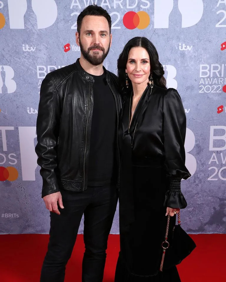 Johnny McDaid and Courteney Cox attend the 2022 BRIT Awards in LondonCredit: JMEnternational/Getty