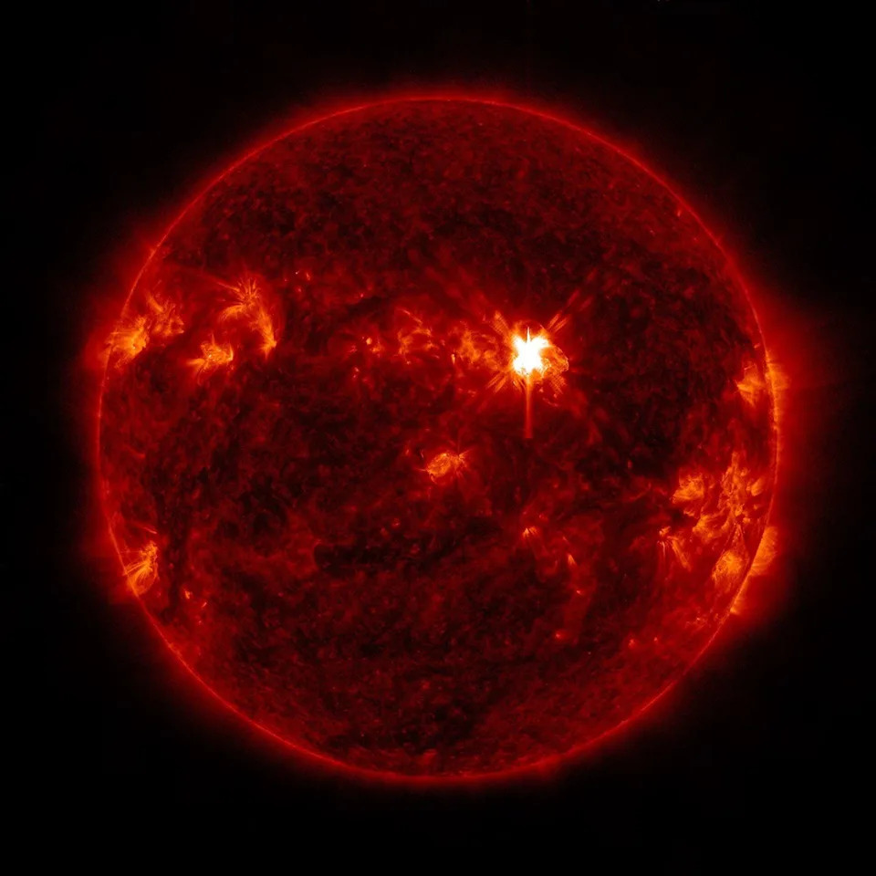 NASA captured this photo of a solar flare, which appears in the image as a bright flash of light, on June 3, 2026. / Credit: NASA/SDO