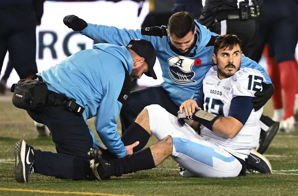 Kelly is tended to by medical staff after his injury during the third quarter of the CFL Eastern final, Nov. 9, 2024 in Montreal. THE CANADIAN PRESS/Graham Hughes