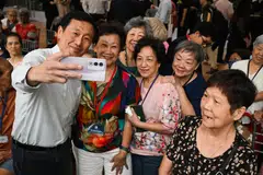 Health Minister Ong Ye Kung taking a wefie at the launch of the DBS Foundation X Thye Hua Kwan Moral Charities partnership on Monday (Oct 13).