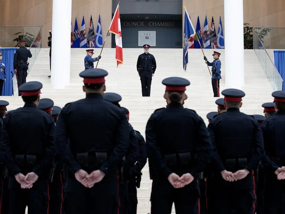 EPS Recruit Training Class 165 during their graduation ceremony at city hall on Friday, June 12, 2026. 34 new police officers and two canines graduated during the ceremony. David Bloom/Postmedia