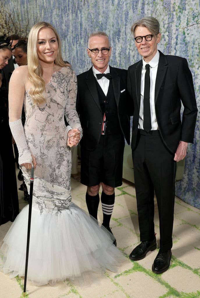 Lindsey Vonn, Thom Browne, and Andrew Bolton attend the 2026 Met Gala celebrating "Costume Art" at the Metropolitan Museum of Art on May 04, 2026 in New York City