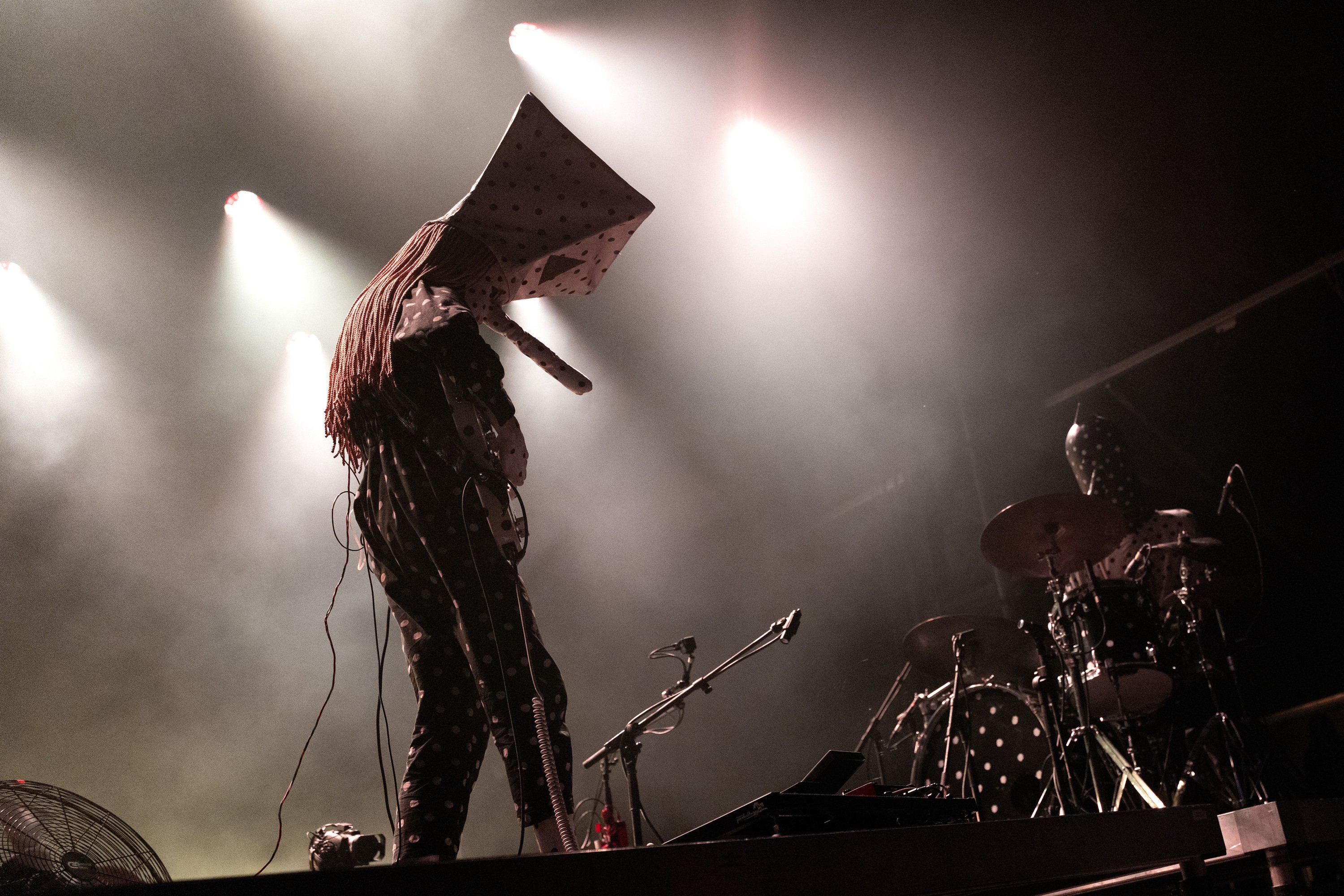 Angine de Poitrine performs on stage.