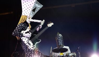 Angine de Poitrine performs on stage.