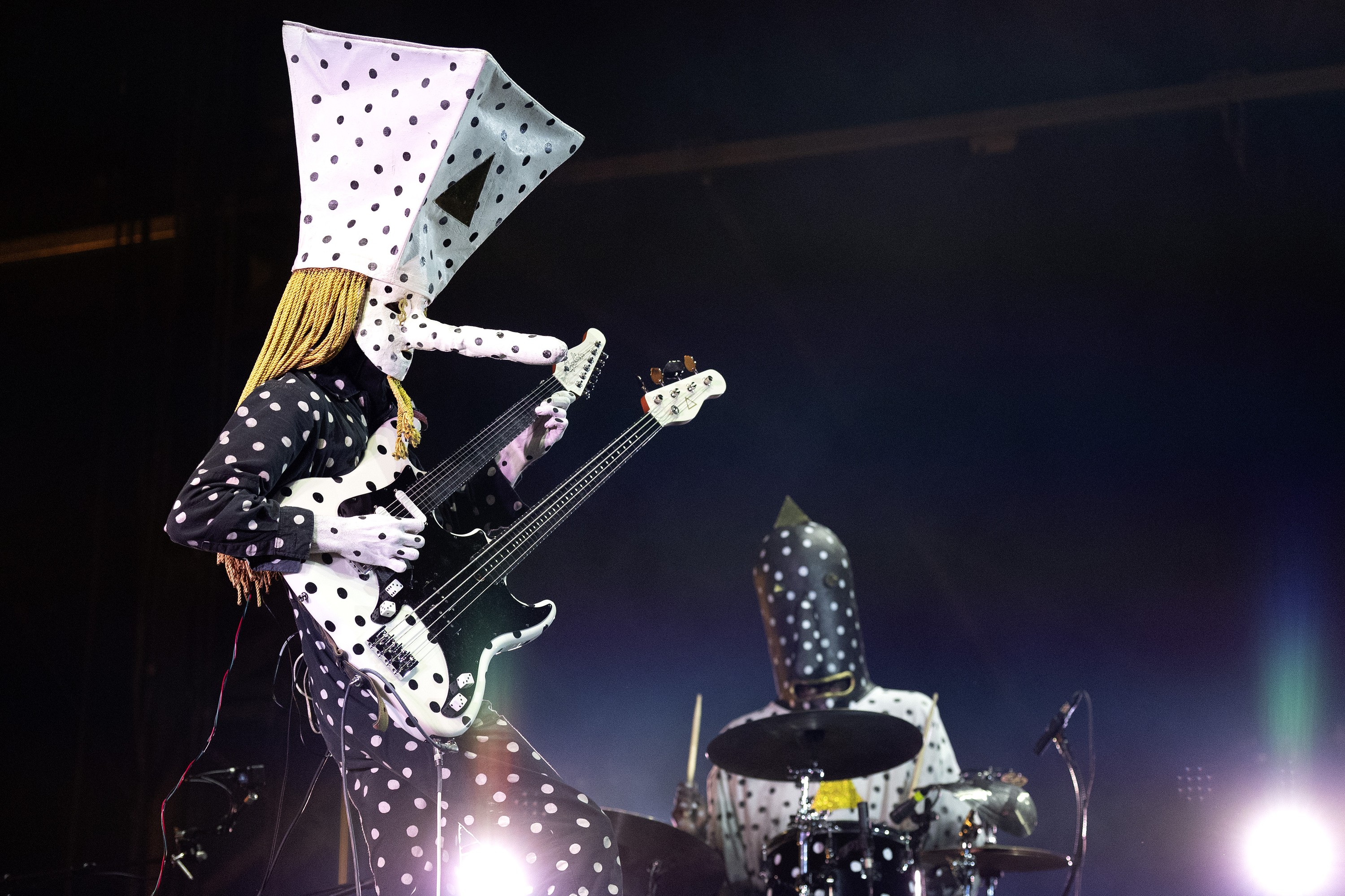 Angine de Poitrine performs on stage.