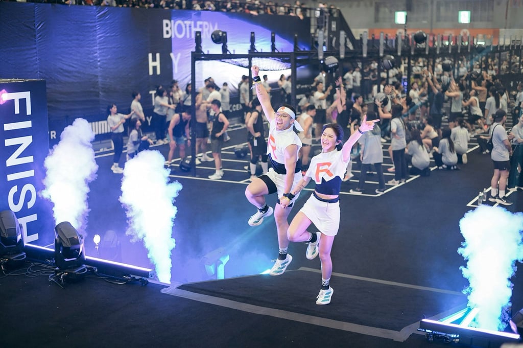 Cheng crosses the finish line of the mixed doubles Hyrox challenge in Taiwan in February 2026 with his friend Jessie. Photo: Keizer Cheng