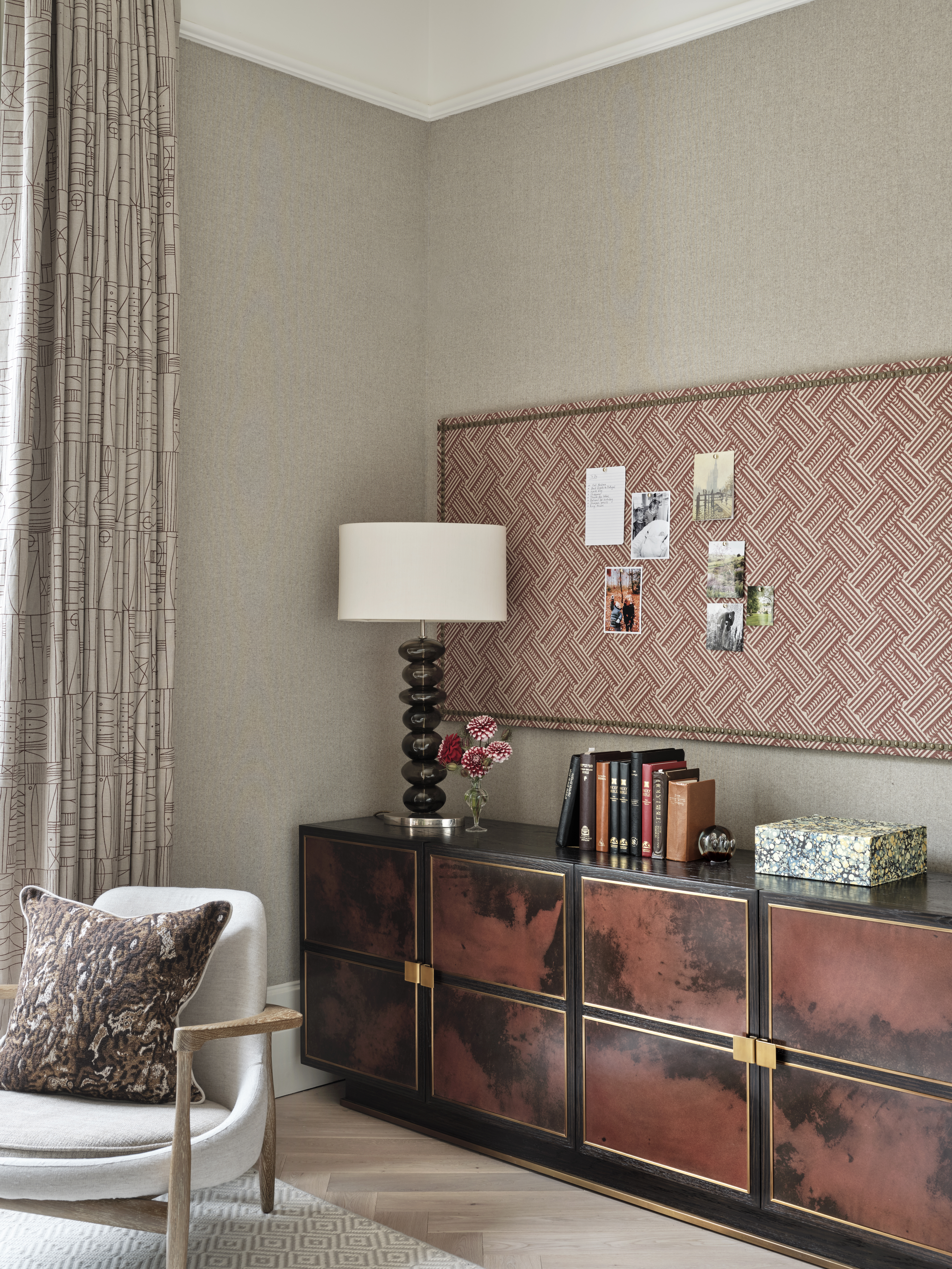 A contemporary living room with fabric pinboard