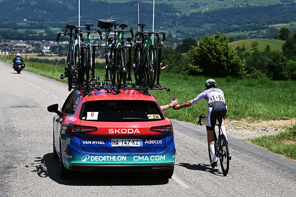 GRAND COLOMBIER, FRANCE - JUNE 13: Paul Seixas of France and Team Decathlon CMA CGM - White Best Young Rider Jersey competes injured after falling during the 78th Tour Auvergne-Rhone-Alpes 2026, Stage 7 a 133.6km stage from La Bridoire to Grand Colombier 1496m / #UCIWT / on June 13, 2026 in Grand Colombier, France. (Photo by Dario Belingheri/Getty Images)