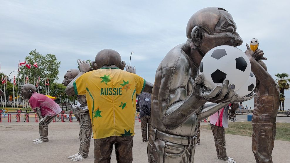 A-maze-ing Laughter Laughing Men English Bay sculptures Vancouver FIFA World Cup