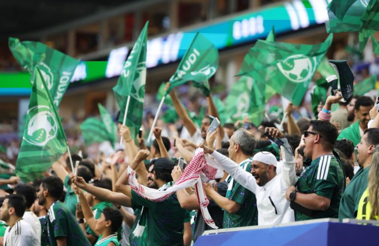 MIAMI, FLORIDA - JUNE 15: Fans of Saudi Arabia celebrate as Abdulelah Al-Amri #4 (not pictured) of Saudi Arabia scores his team's first goal during the FIFA World Cup 2026 Group H match between Saudi Arabia and Uruguay at Miami Stadium on June 15, 2026 in Miami, Florida. Alex Slitz/Getty Images/AFP (Photo by Alex Slitz / GETTY IMAGES NORTH AMERICA / Getty Images via AFP)