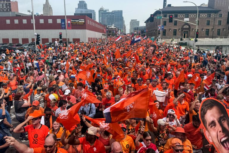 Netherlands fans react.