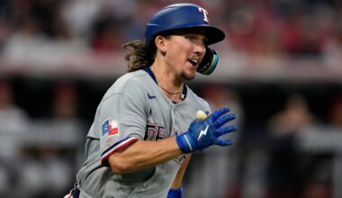 Texas Rangers' Cameron Cauley runs towards first base with a triple, his first major league hit, in the seventh inning of a baseball game against the Cleveland Guardians in Cleveland, Monday, June 29, 2026. (AP Photo/Sue Ogrocki)