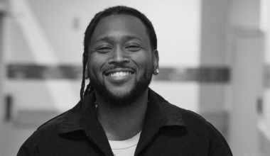 Left, music producer Boi-1da smiling straight at the camera.