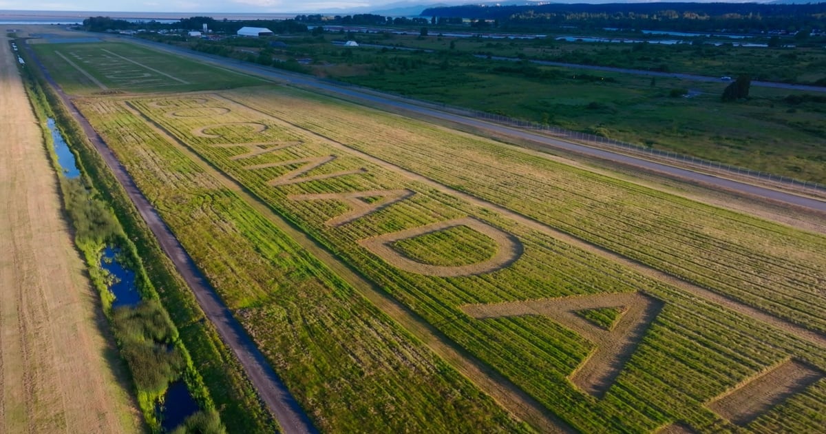 YVR welcomes Team Canada with massive message in grass