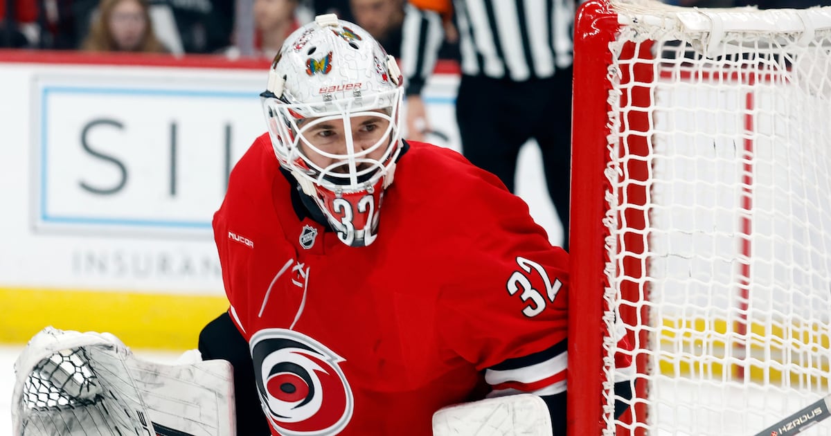 Carolina Hurricanes’ Bussi in starter’s net for practice