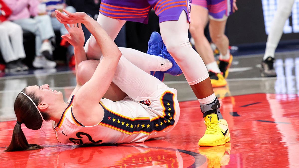 Caitlin Clark falling during a game in Indianapolis