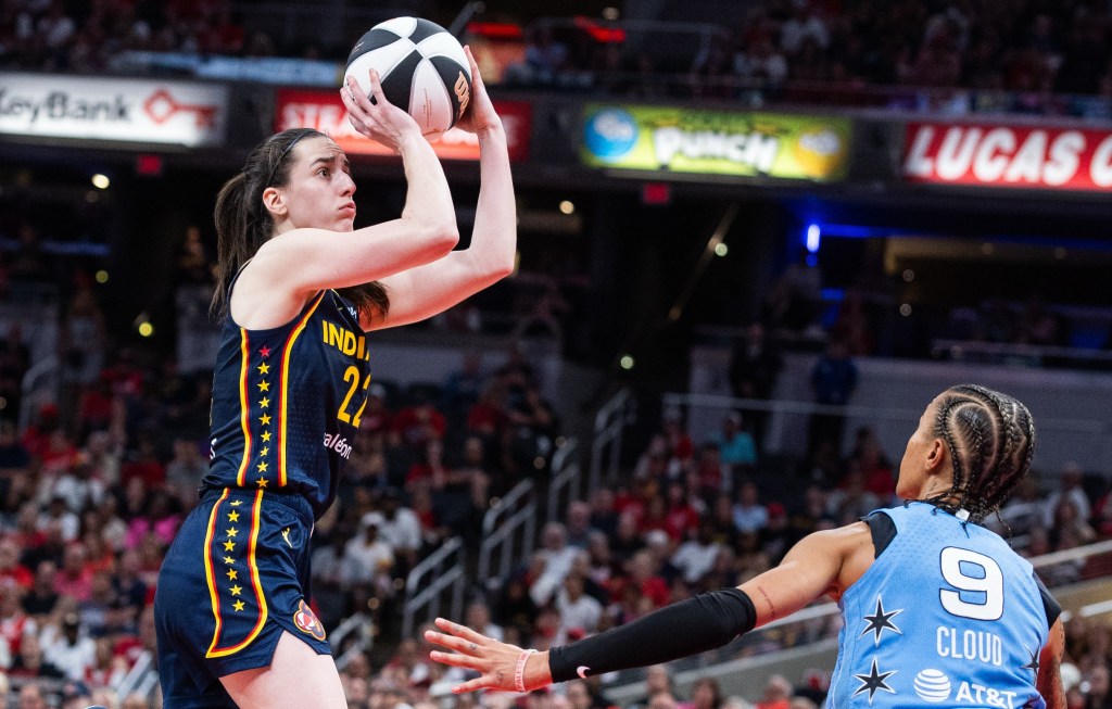 Caitlin Clark, who had 32 points and 10 assists, shoots a jumper over Natasha Cloud during the Fever's 114-106 win over the Sky on June 11, 2026 in Indianapolis.