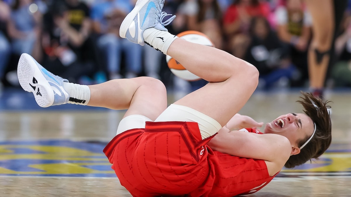 Caitlin Clark of the Indiana Fever reacting after a flagrant foul at Wintrust Arena in Chicago