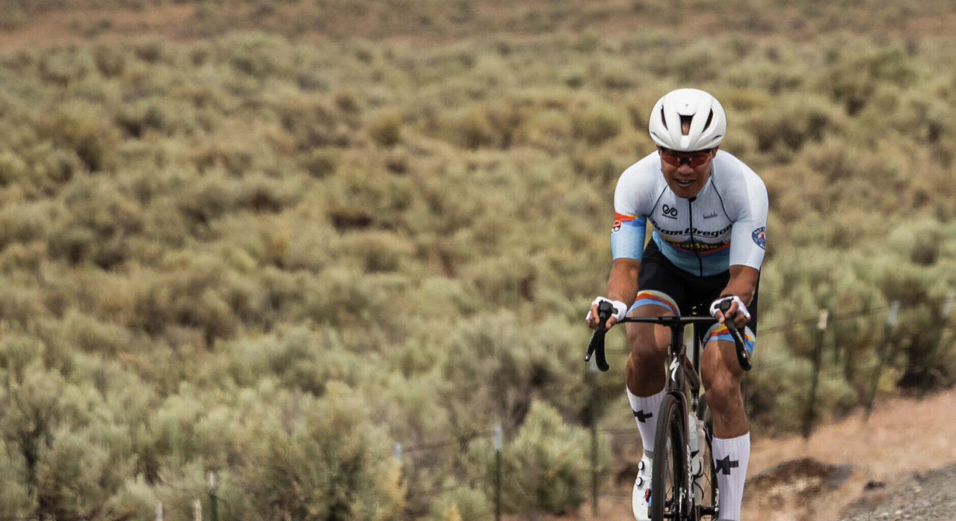 Cycling West Late Spring 2026 Cover Photo: A solo rider in stage 1 of the 2025 Baker City Classic. Photo by Sean Benesh
