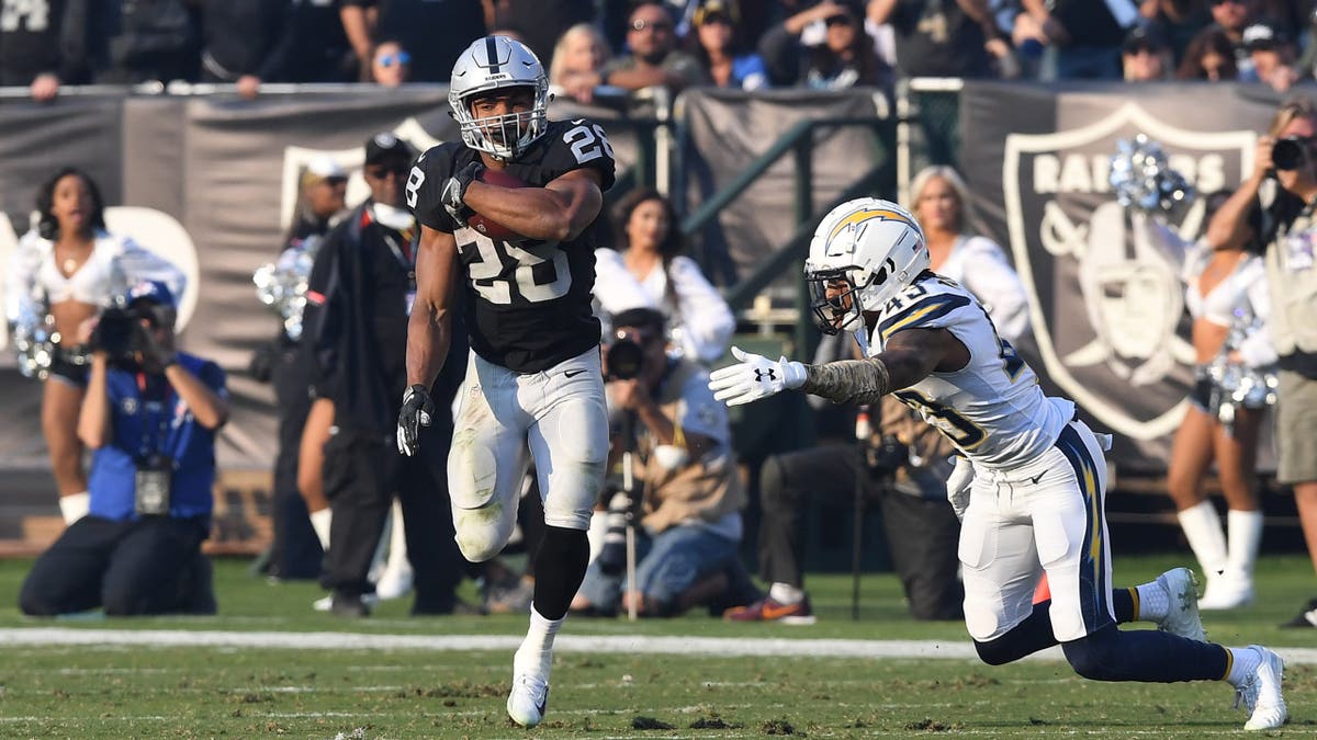 Doug Martin carrying football during NFL game