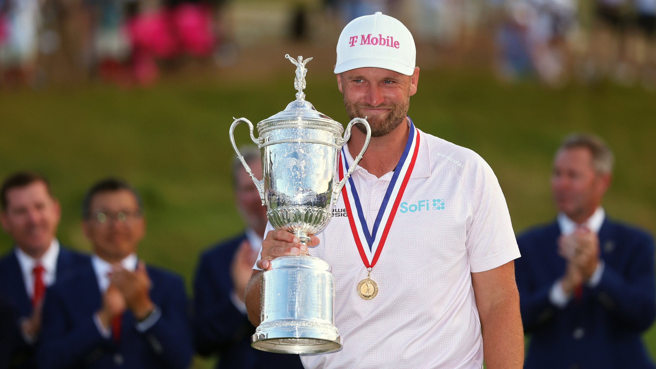 Wyndham Clark holds the US Open trophy at Shinnecock Hills