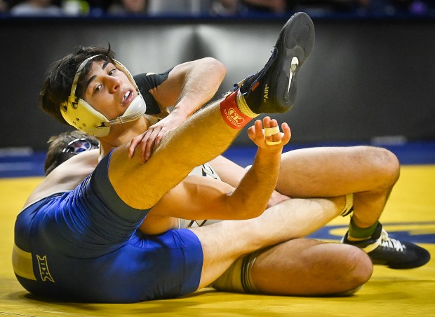 University of Northern Colorado wrestler Andrew Alirez works for position during his last home meet against Air Force on Sunday Feb. 23, 2025.(Jim Rydbom/Staff Photographer)