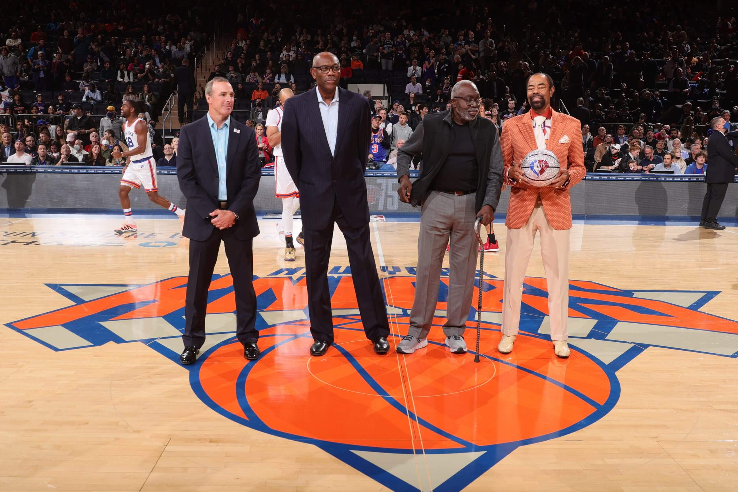 Peter DeBusschere, Bob McAdoo, Earl Monroe and Walt Frazier are recognized in 2021 on the 75th anniversary of the first NBA game at Madison Square Garden in New York. (Nathaniel S. Butler / NBAE via Getty Images)