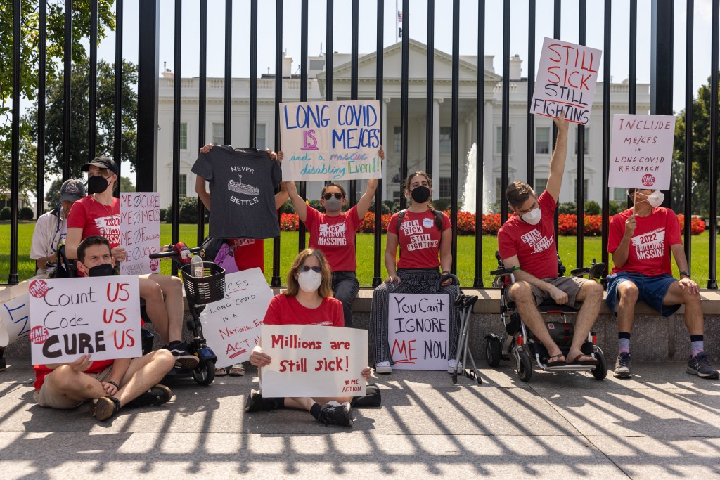 Washington DC, USA- September 19: Protestors chant outside the White House to call attention to those suffering from Myalgic Encephalomyelitis and âlong Covidâ on September 19th, 2022 in Washington, DC. (Photo by Nathan Posner/Anadolu Agency via Getty Images)