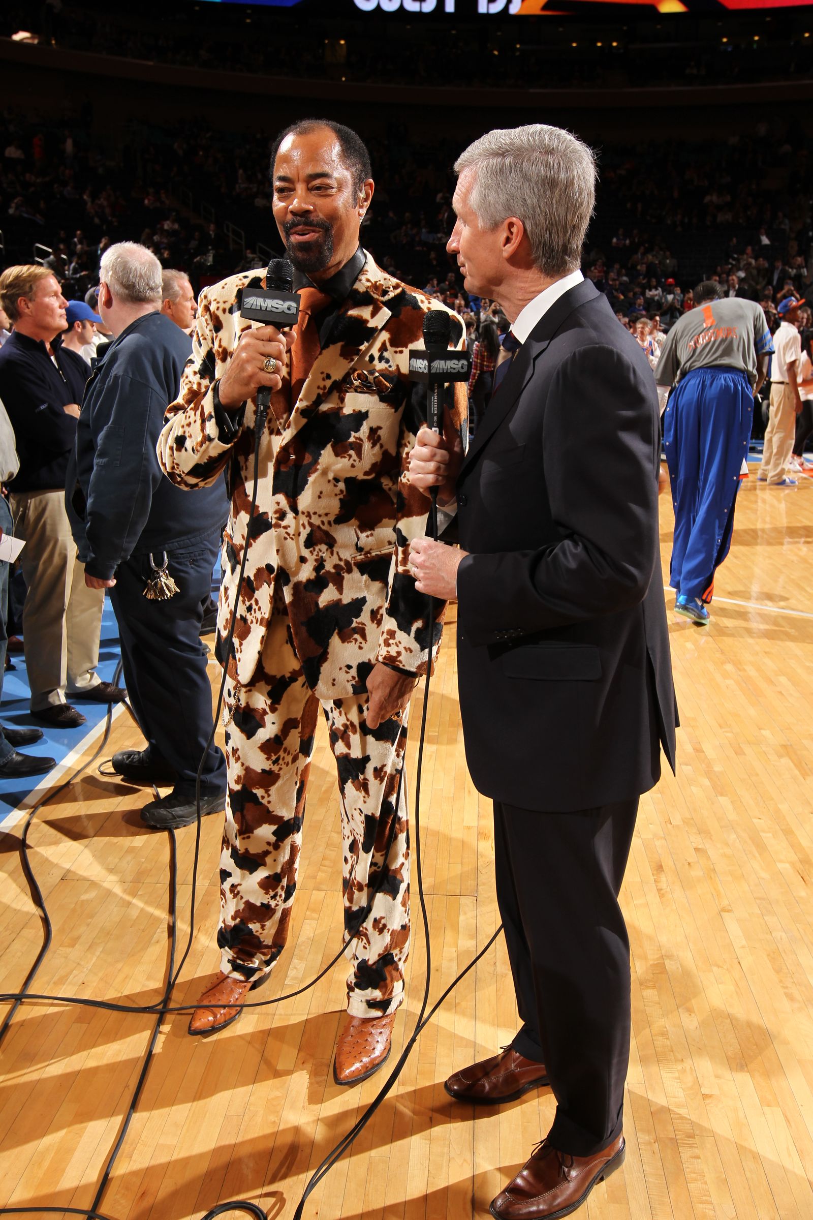 Image may contain Walt Frazier Mike Breen Bill Nelson Greg Fischer Conversation Person Interview Adult and Clothing