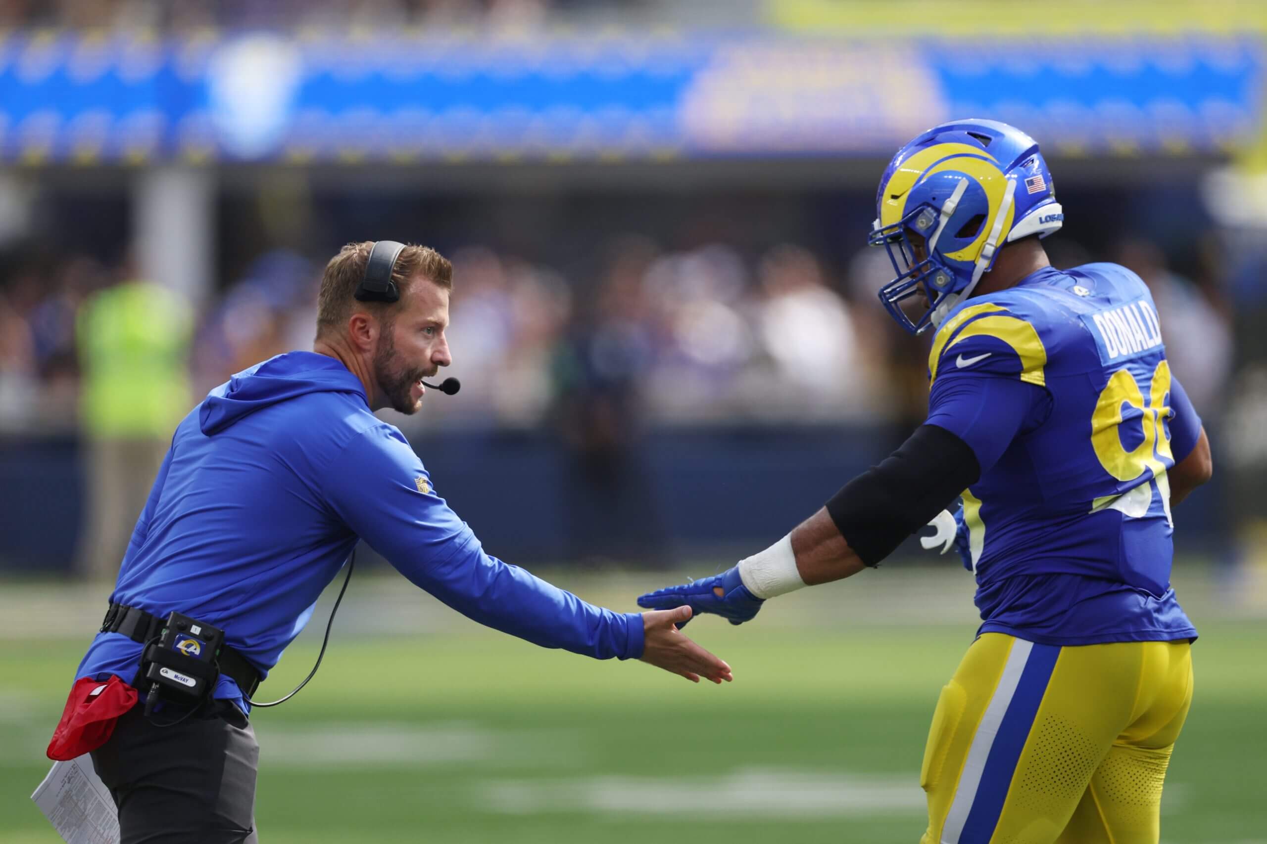 Rams coach Sean McVay greets Aaron Donald during a 2023 game against the Arizona Cardinals.