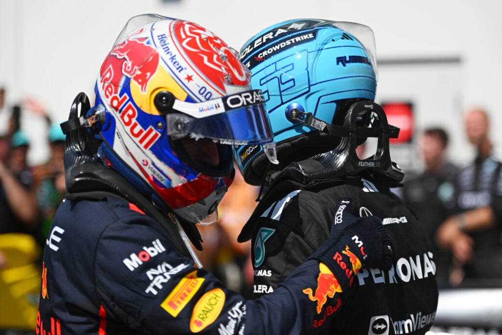 Red Bull Racing driver Max Verstappen greeting Mercedes driver George Russell after the 2025 Formula 1 Canadian Grand Prix
