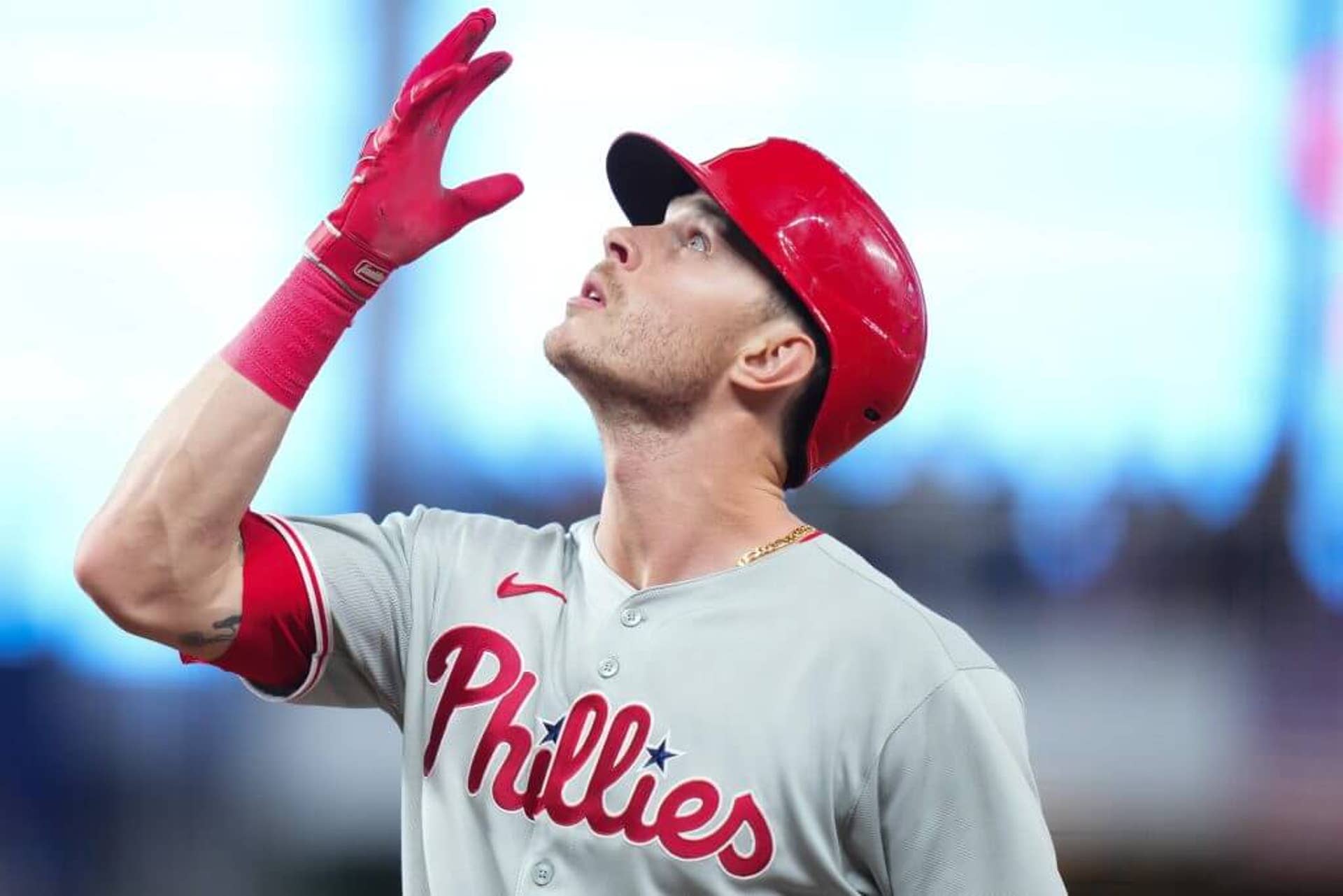 Philadelphia Phillies' Max Kepler holds up his right hand and looks skyward after hitting a single against the Miami Marlins.