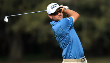 PONTE VEDRA BEACH, FLORIDA - MARCH 15: Corey Conners of Canada hits his second shot on the 14th hole during the final round of THE PLAYERS Championship 2026 at THE PLAYERS Stadium course at TPC Sawgrass on March 15, 2026 in Ponte Vedra Beach, Florida.